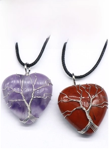 Detail of tree of life wire-wrapped heart-shaped amethyst and red jasper pendants