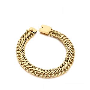 Detail of 23mm wide golden stainless steel Cuban chain necklace with secure square buckle