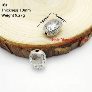 Detailed view of silver elephant beads with 19x14mm dimensions for DIY jewelry making