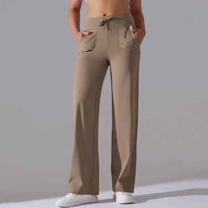 Detail shot of khaki high waist yoga pants showing drawstring and side pocket texture