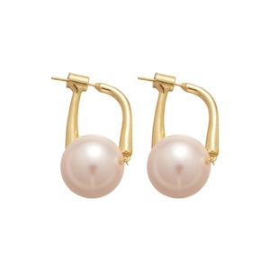 Elegant vintage round pink pearl stud earrings with gold metal base on white background