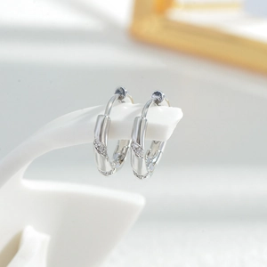 Three-pair silver hoop earring set with cubic zirconia and twisted rope texture design