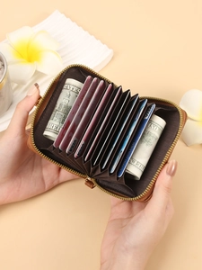 Brown lychee texture leather card holder with zip closure and multiple card slots