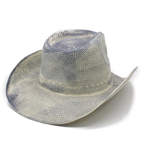 Macro view of woven straw cowboy hat showing vintage blue and beige texture detail
