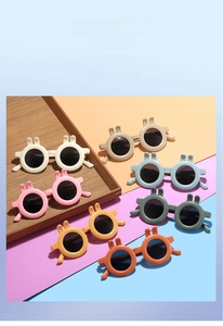 Detailed view of colorful rabbit ear children sunglasses in seven macaron shades