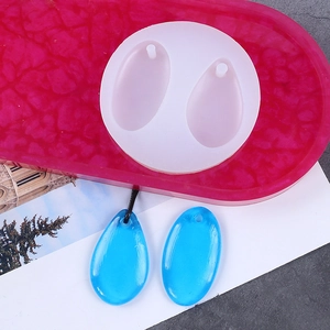 Detail of water drop silicone mold for resin jewelry and blue transparent DIY pendants