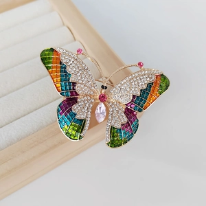 Elegant colorful butterfly brooch with enamel wings and micro-pave crystals in gold finish