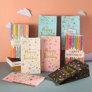 Colorful Happy Birthday kraft paper gift bags for party favors with balloon patterns