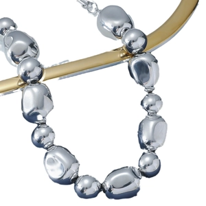 Punk silver lava bead necklace with liquid metal texture on golden display rod