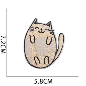 Embroidered cartoon cat patch featuring beige smiling kitten 7.2cm x 5.8cm size