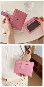 Detail view of pink PU leather wallet showing internal card slots and snap button closure