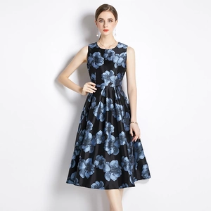 Elegant sleeveless black A-line dress with blue floral jacquard and waist-cinching fit