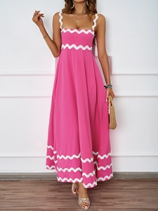 Detail of pink summer maxi dress with white wavy lace trim and sleeveless strap design