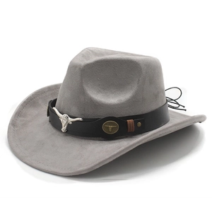 Detailed view of grey suede cowboy hat with metallic bull head ornaments and leather band