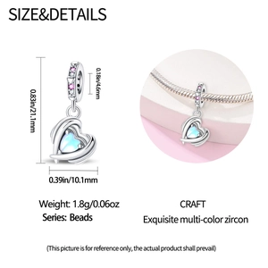 Detailed size and dimension view of a heart charm with blue gradient gem and zircons