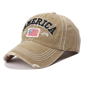 Detail of khaki washed cotton baseball cap with embroidered America logo and flag