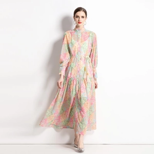 Retro ethnic print maxi dress with lantern sleeves and contrast patterns