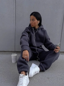 Women's dark gray oversized hooded tracksuit set featuring relaxed sports style design