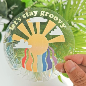 Holographic sun and rainbow static glass decal with let's stay groovy text detail