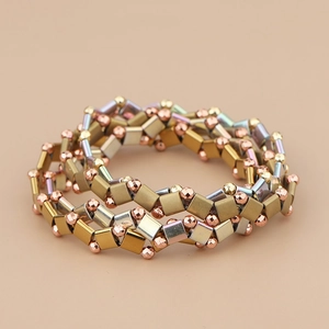 Multi-row TILA beaded stretch bracelet with gold, silver, and rose gold geometric beads