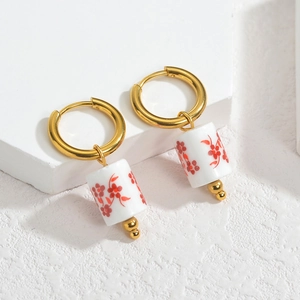 Retro cylinder porcelain earrings with red floral patterns and 18k gold-plated hoops