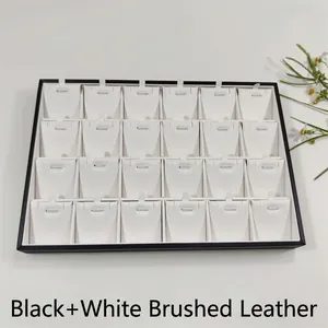 24-grid jewelry display tray with brushed leather hooks for pendants and necklaces