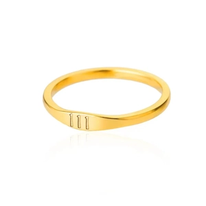 Polished gold stainless steel ring with 111 angel number engraving on white background