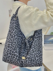 Blue-grey leopard print canvas tote bag with bow detail and zakka metal logo tag