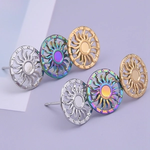Three pairs of sun-shaped stud earrings in silver, gold, and rainbow metallic finishes