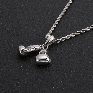 Detailed view of silver boxing glove pendants on a durable twisted rope chain necklace