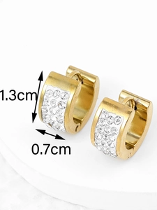 Detailed view of gold stainless steel hoop earrings with crystal inlay and size markers