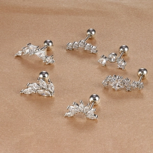 Leaf and star stainless steel cartilage earrings with zircons on gold silk