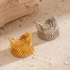 Chic 18K gold and silver plated geometric sunburst open rings on desert sand