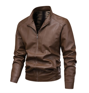 Close-up of brown faux leather jacket featuring standing collar and lychee texture grain