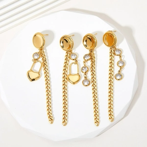 Gold plated stainless steel tassel earrings with heart zircon pendants on geometric base