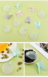 Detailed view of colorful butterfly silicone tea infusers in pink, purple and blue shades
