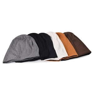 Vertical ribbed knitted beanies in six colors including grey, black, blue, yellow and brown