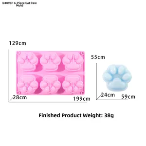 Dettaglio stampo in silicone rosa a 6 cavità zampa di gatto con saggio in resina blu
