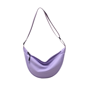 Purple nylon crescent crossbody bag with adjustable shoulder strap and black zipper