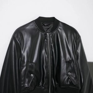 Oversized black coated bomber jacket with leather luster and ribbed knit trim detail