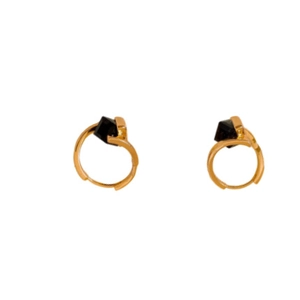 Elegant gold hoop earrings featuring square black gemstones on minimalist white background