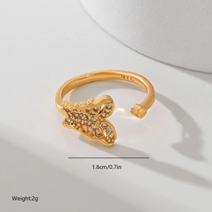 Detail of gold butterfly ring with zircons, engraved HYL mark and 1.8cm size label