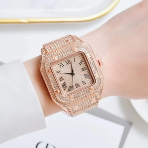 Close-up of rose gold square quartz watch with full diamond inlay and Roman numerals