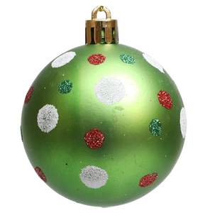 Detail of green Christmas ball with colorful glitter dots and golden hanging loop