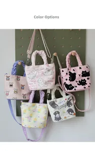 Detailed set of canvas bucket bags with cartoon prints and cloud-shaped handles