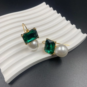Vintage style gold earrings with emerald green square gemstones and elegant white pearls