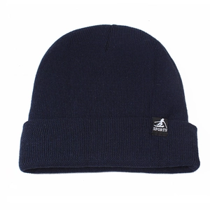 Unisex navy blue knit beanie with fleece lining and SPORTS patch for winter warmth