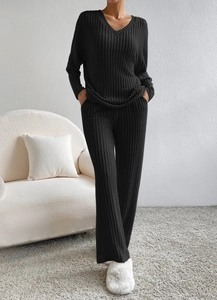 Women's two-piece black V-neck ribbed knit set with long sleeves and wide-leg trousers