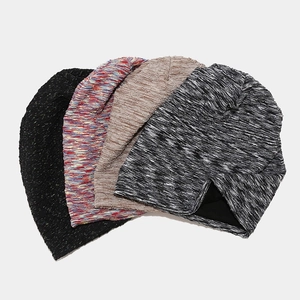 Knitted slouchy beanies in four colors: black, rainbow, khaki, and gray melange mix