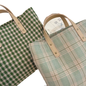 Retro plaid woven small tote bags with green checkered patterns and leather handles